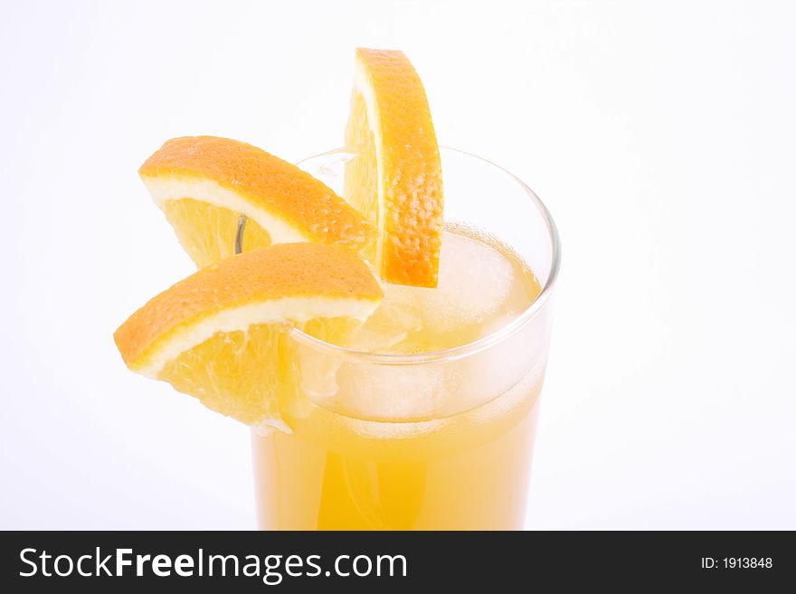 Orange juice and half-cut oranges isolated on white
