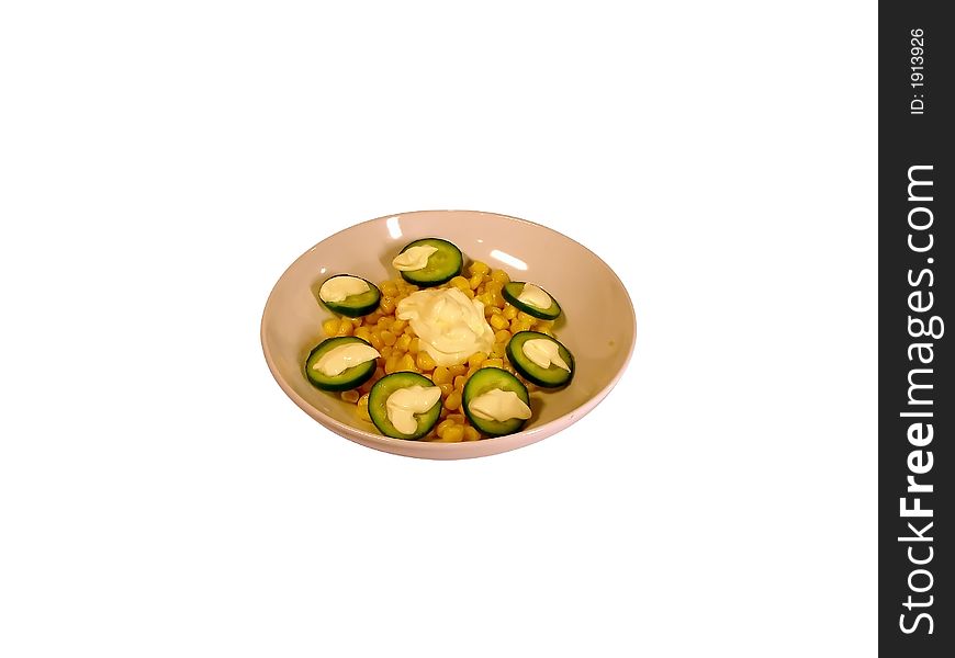 Maize in plate with cucumbers and mayonnaise. Maize in plate with cucumbers and mayonnaise