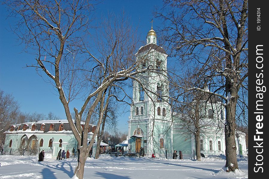 Russia church at winter tree