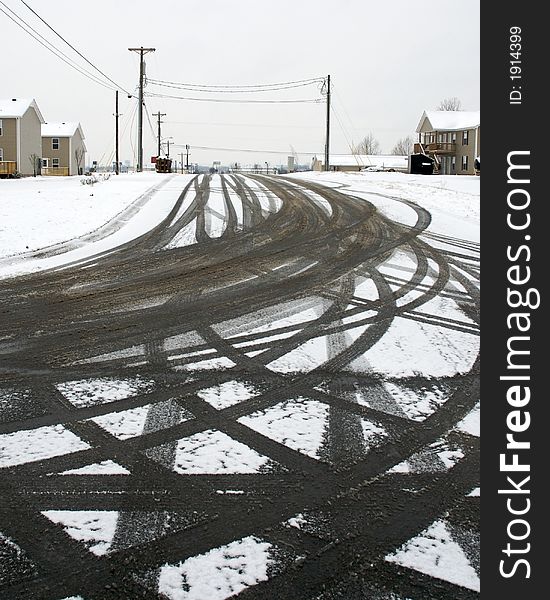 A lot of tire Tracks in the snow