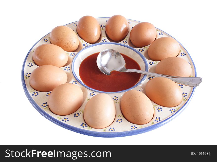 Eggs on a plate and sauce