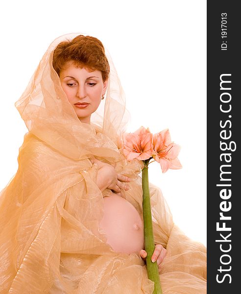 Beautiful Pregnant Woman With A Flower