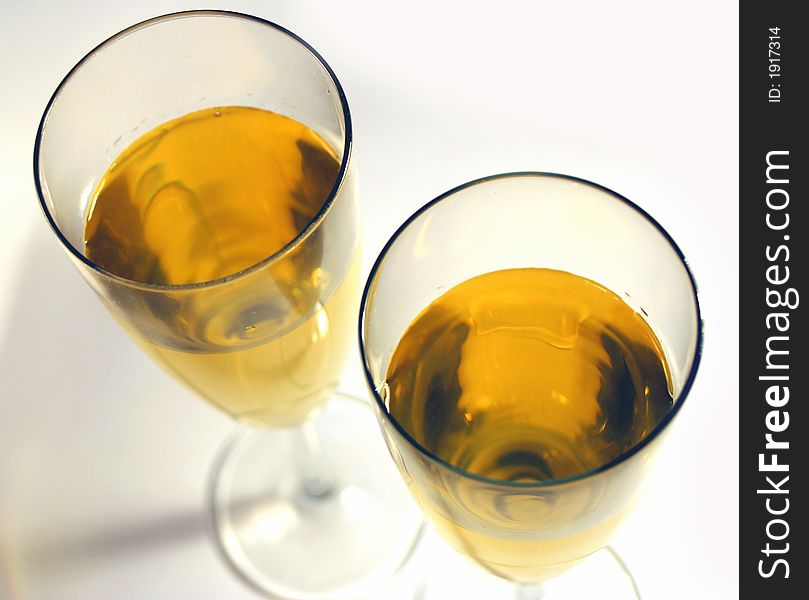 Two glasses of wine on white background