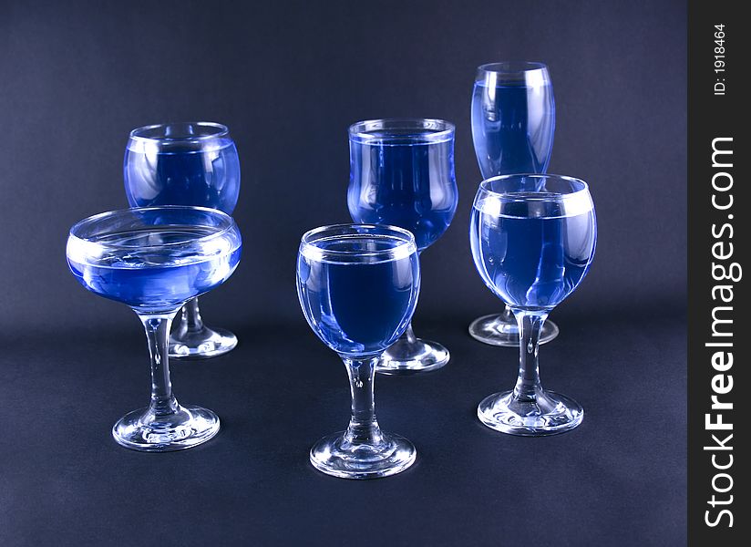 Glasses with a blue drink