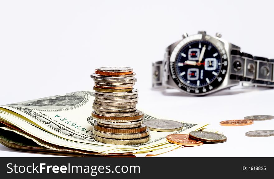 View of banknotes , some coins beside and watch. View of banknotes , some coins beside and watch