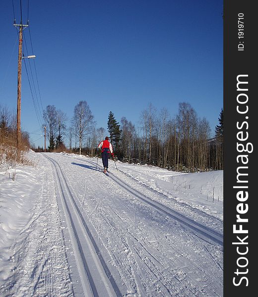 Man skiing on a fine day