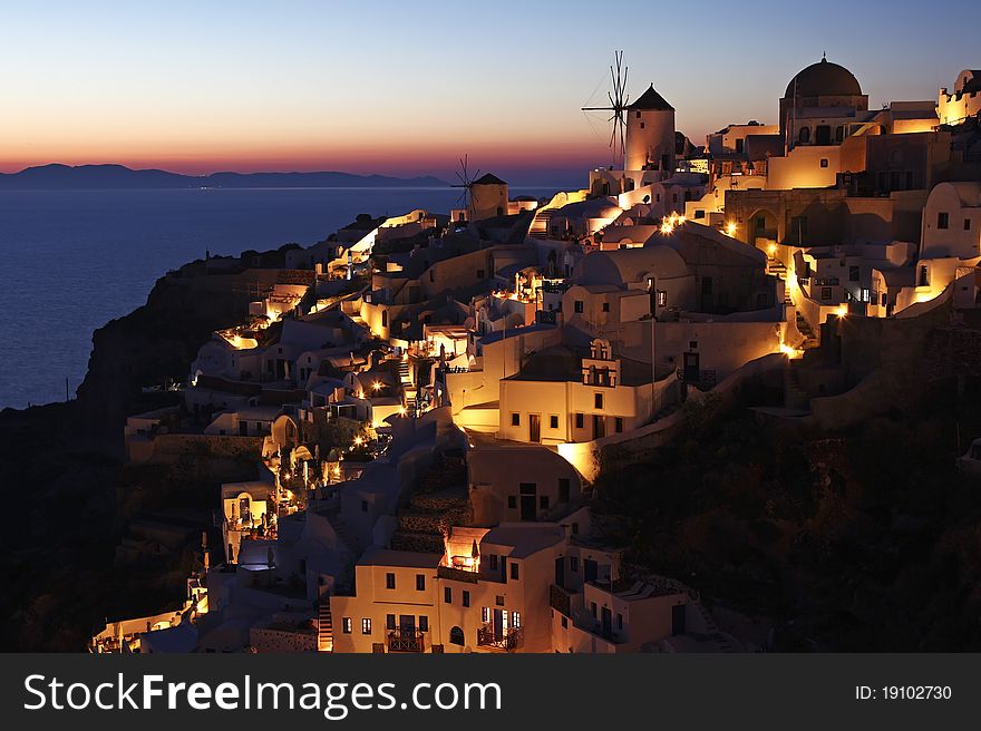 Oia white wash building at dusk in santorini island Greece. Oia white wash building at dusk in santorini island Greece