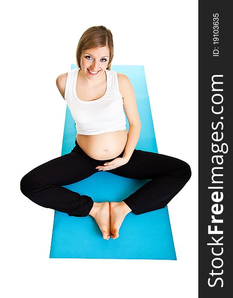 Pregnant caucasian woman fitness isolated on white background. Pregnant caucasian woman fitness isolated on white background