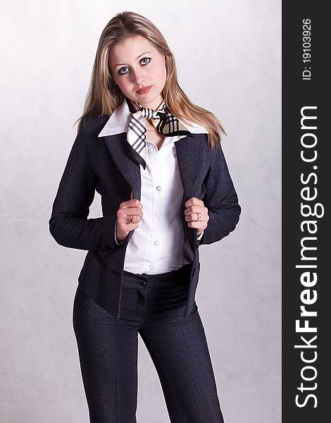 Young  beautiful businesswoman against white background