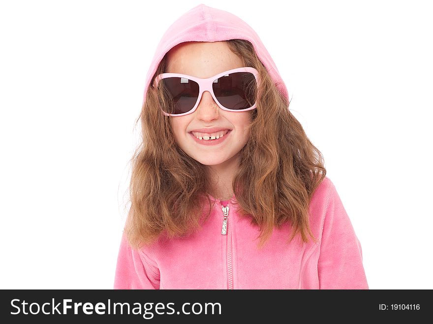 Young girl in pink top and sunglasses with funny face expression. Young girl in pink top and sunglasses with funny face expression