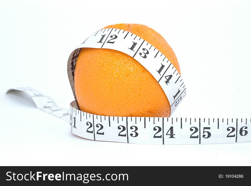 Orange and meter on a white background - Diet composition