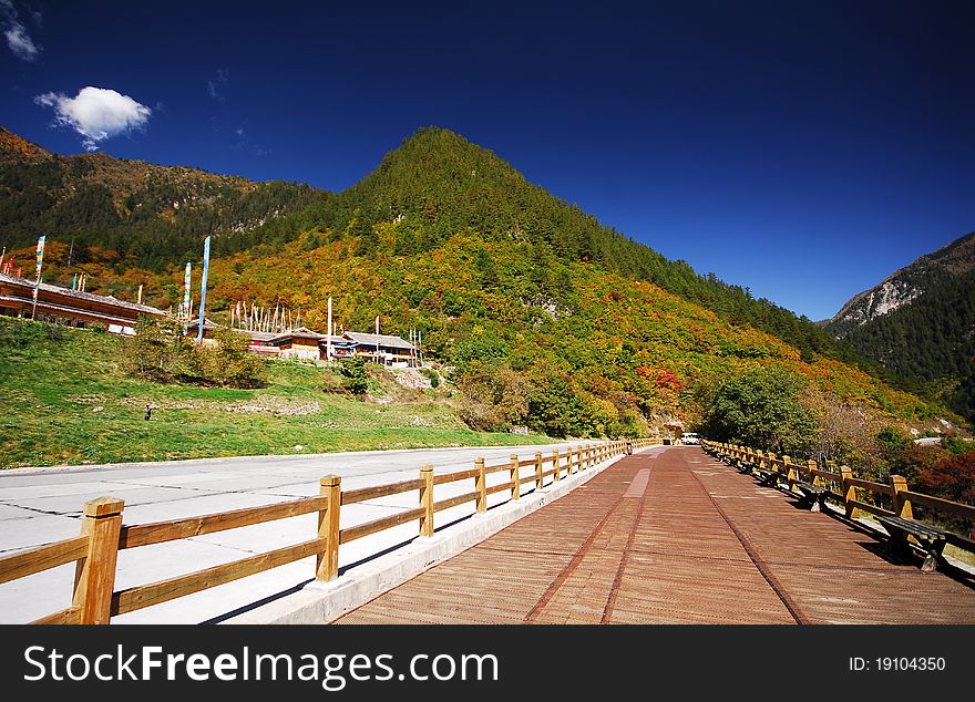 Road and wooden walkway in Jiuzhai Valley Sichuan China. Road and wooden walkway in Jiuzhai Valley Sichuan China