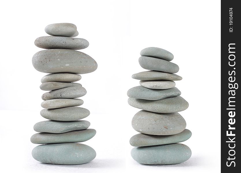 Balancing nature stones isolated on a white. Balancing nature stones isolated on a white