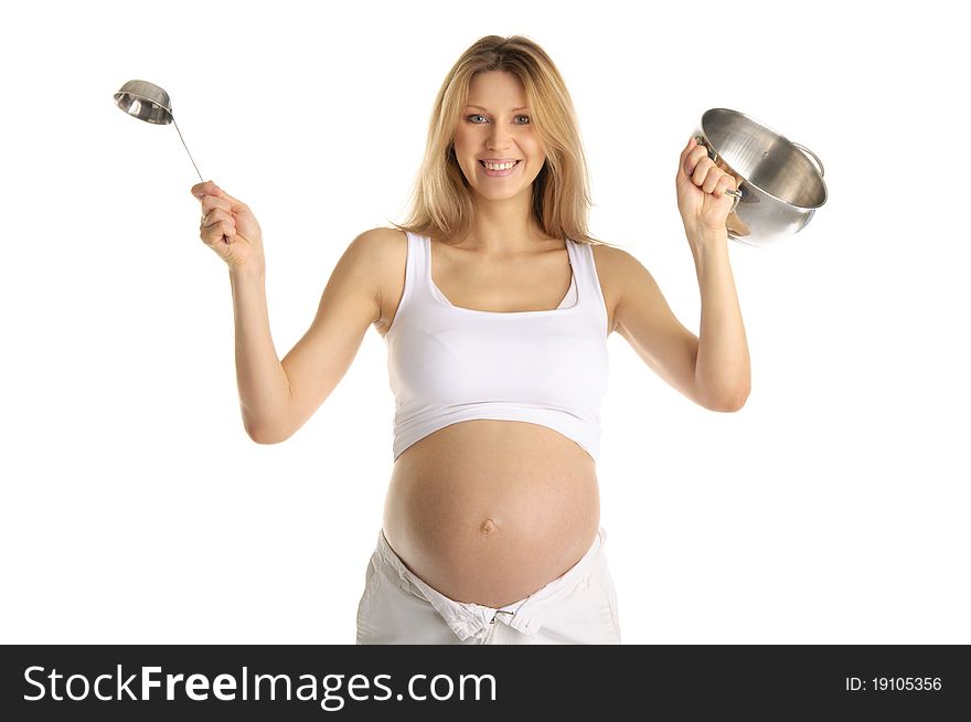Happy pregnant woman with cooking utensils isolated on white