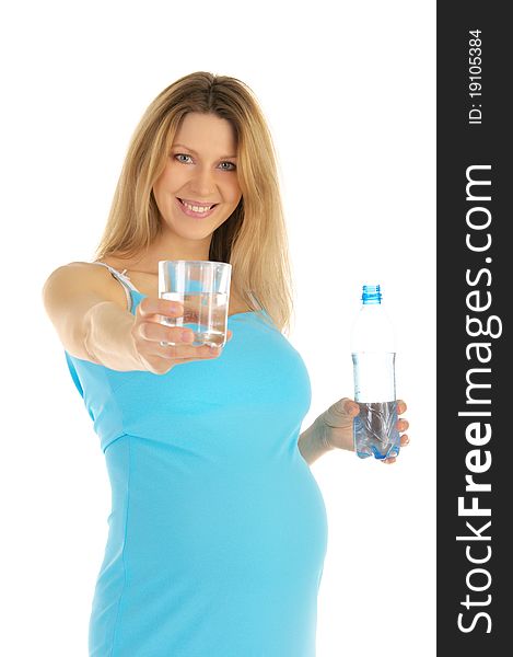 Pregnant woman holds out glass of water isolated on white