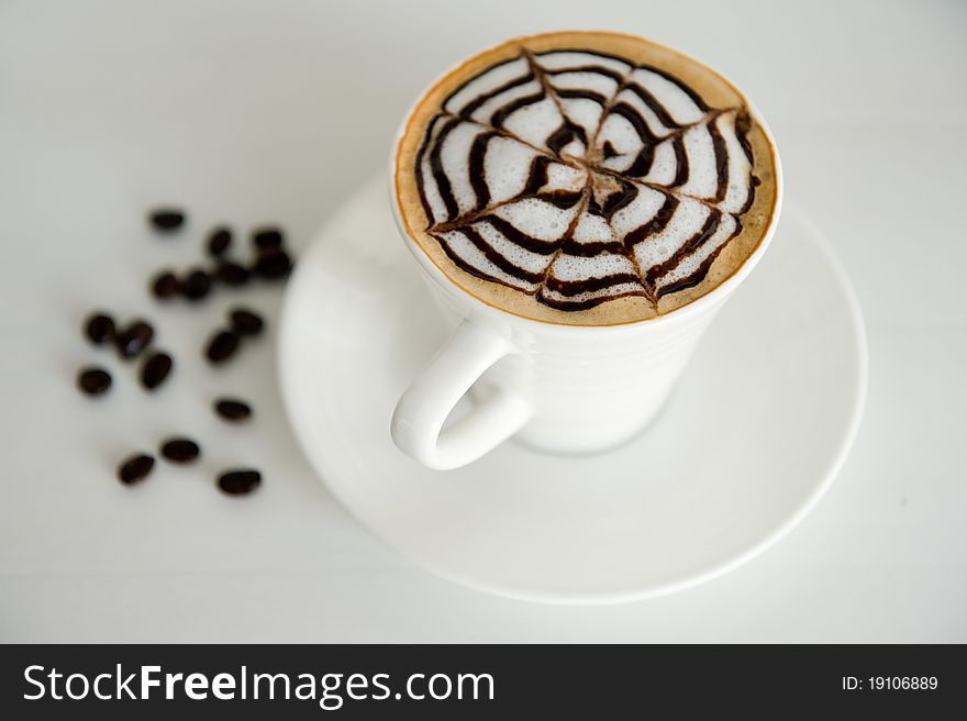 Coffee background: Close-up of a beans, cup