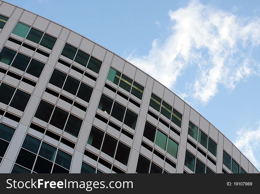 Moscow. Wall of the modern building. Glass and sky