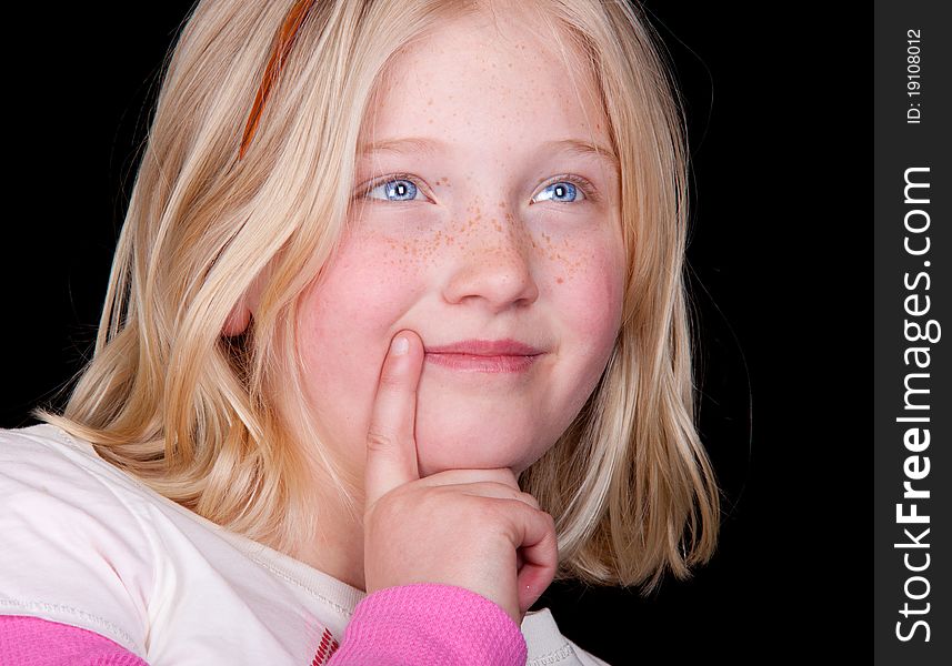 A nice image of a cute young girl thinking about what is going to happen today. A nice image of a cute young girl thinking about what is going to happen today.