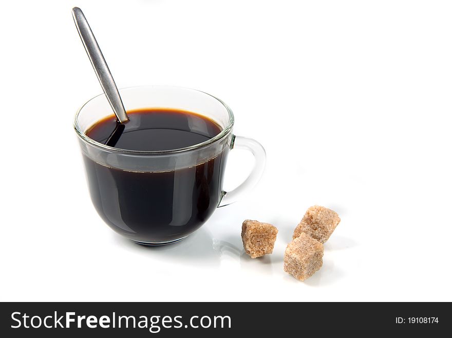 Coffee with milk and sugar parts on a white background with reflexion. Coffee with milk and sugar parts on a white background with reflexion