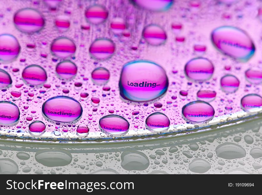 Envelope symbol reflected in the drops of water. Close-up of water droplets placed on a DVD disc. Envelope symbol reflected in the drops of water. Close-up of water droplets placed on a DVD disc.