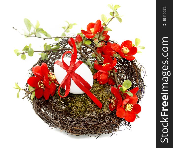Easter decoration in red with flowering Chaenomeles branch. Easter decoration in red with flowering Chaenomeles branch