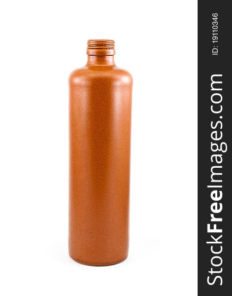 Clay bottle against a white background