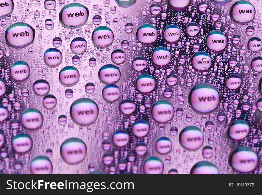 The word web in water drops. Close-up of studo shot.Internet symbols are very popular and they are recognisable all over the world. The word web in water drops. Close-up of studo shot.Internet symbols are very popular and they are recognisable all over the world.