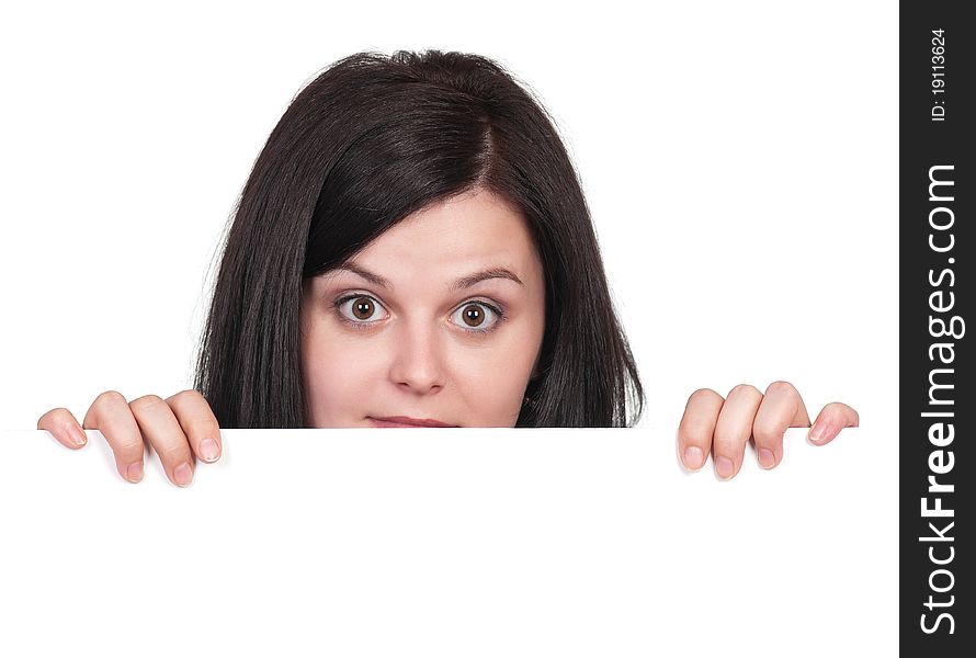 Portrait of a beautiful young woman with blank billboard on white background