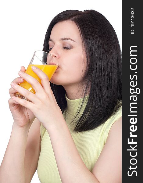 Happy young woman with a glass of refreshing oranges juice - isolated on white. Happy young woman with a glass of refreshing oranges juice - isolated on white.