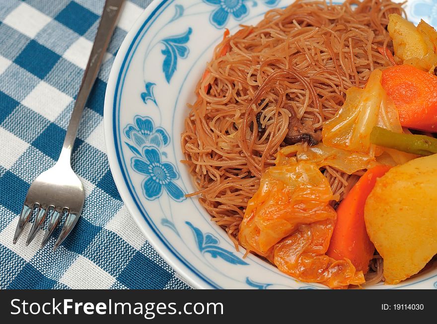 Asian style bee hoon with mixed vegetable curry. Asian style bee hoon with mixed vegetable curry.