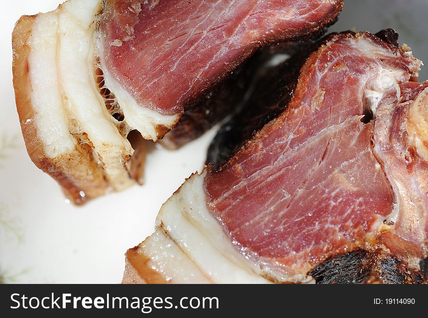 Closeup view of two pieces of preserved pork