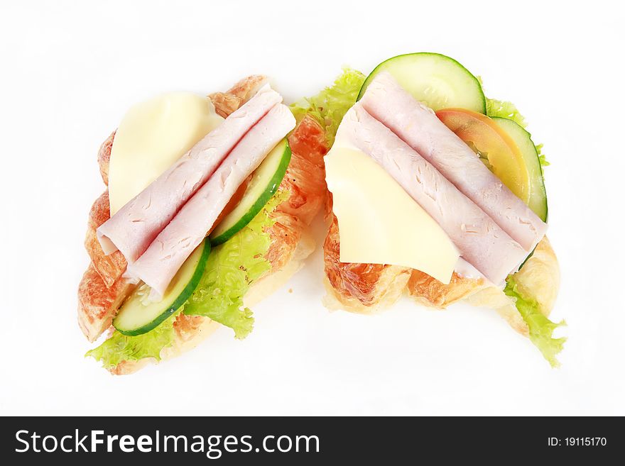 Tasty ham cheese croissant sandwich isolated on white