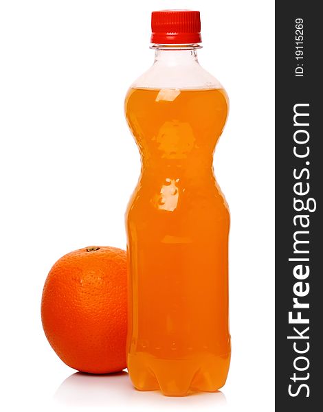Bottle of soda and orange isolated on a white background