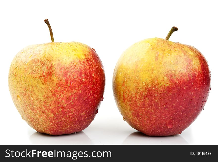 Two fresh apples isolated on a white background