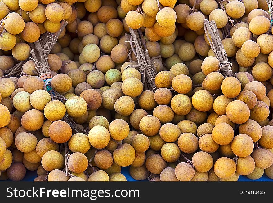 Typical tropical fruit called longan or lungan, background, texture. Typical tropical fruit called longan or lungan, background, texture