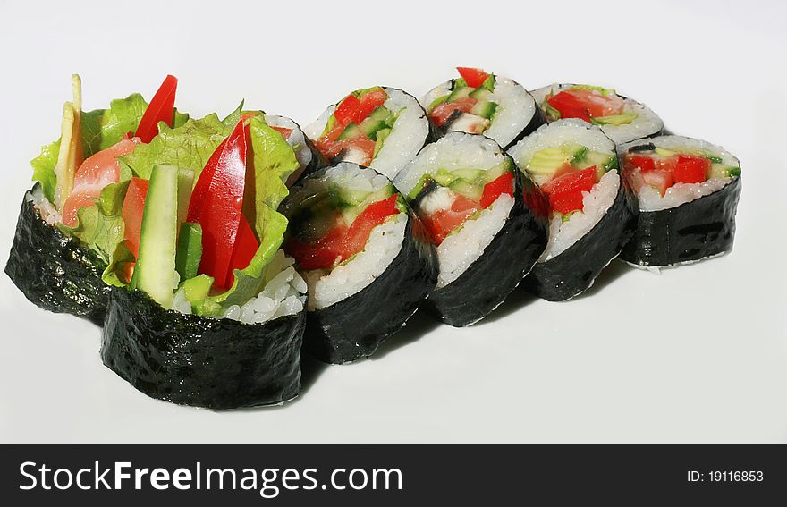 Tasty sushi set with fish and red pepper