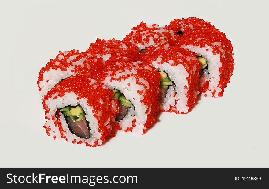 Tasty sushi set with fish, avocado and caviar. Tasty sushi set with fish, avocado and caviar