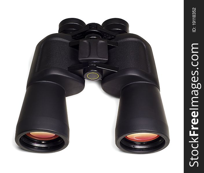 Binoculars with orange color reflection on lenses. Top view. Isolated on white background. Binoculars with orange color reflection on lenses. Top view. Isolated on white background