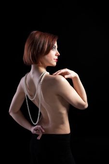 Woman With Naked Spine And Pearl Beads Stock Images Woman With Naked Spine And Pearl Beads Stock Images