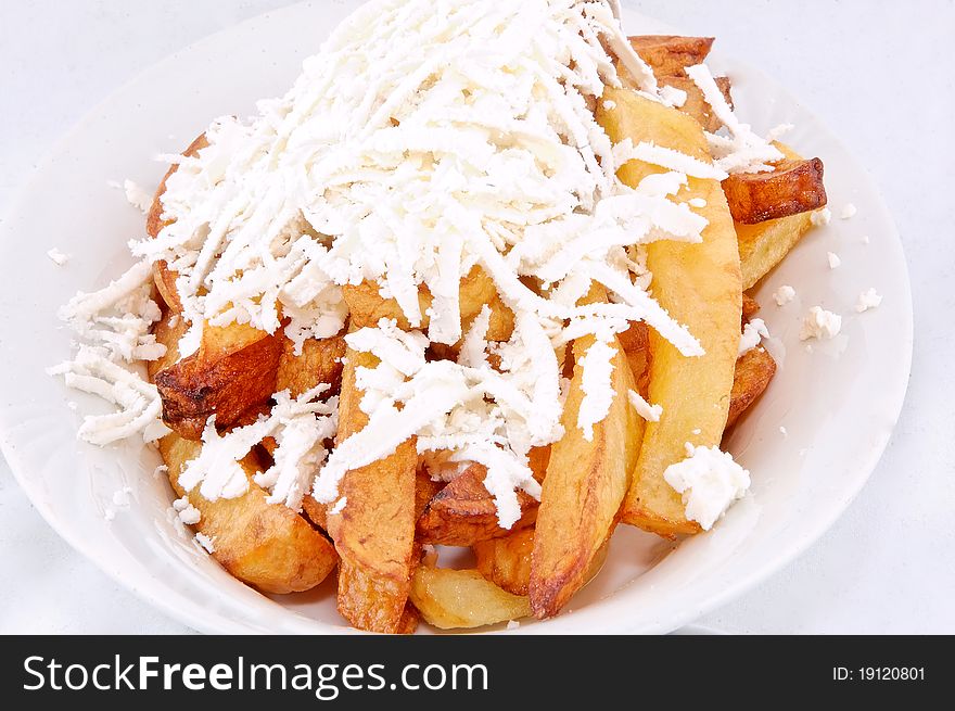 Close-up of french fries with cheese. Close-up of french fries with cheese