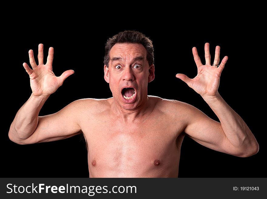 Middle Age Shirtless Man Screaming and Shouting in Horror on Black Background. Middle Age Shirtless Man Screaming and Shouting in Horror on Black Background