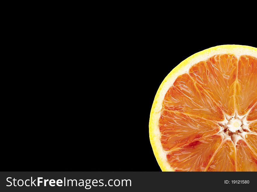Close up of an Orange on dark background