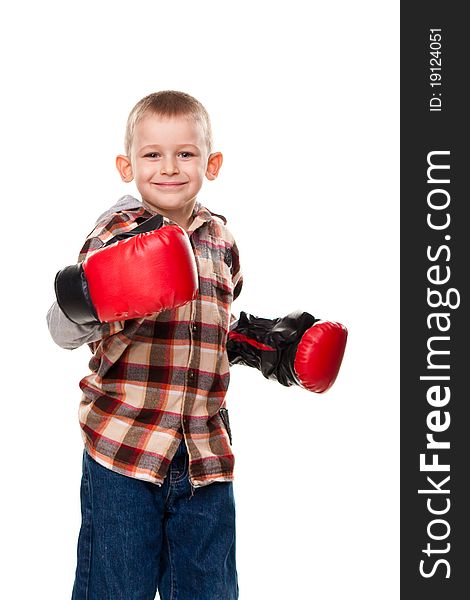 Cute boy in the boxing gloves isolated on white