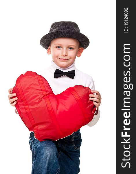 Cute boy with red heart isolated on white