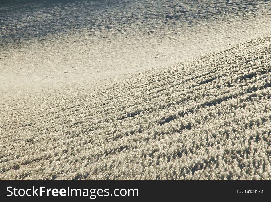 Snow background with beautiful ice crystals