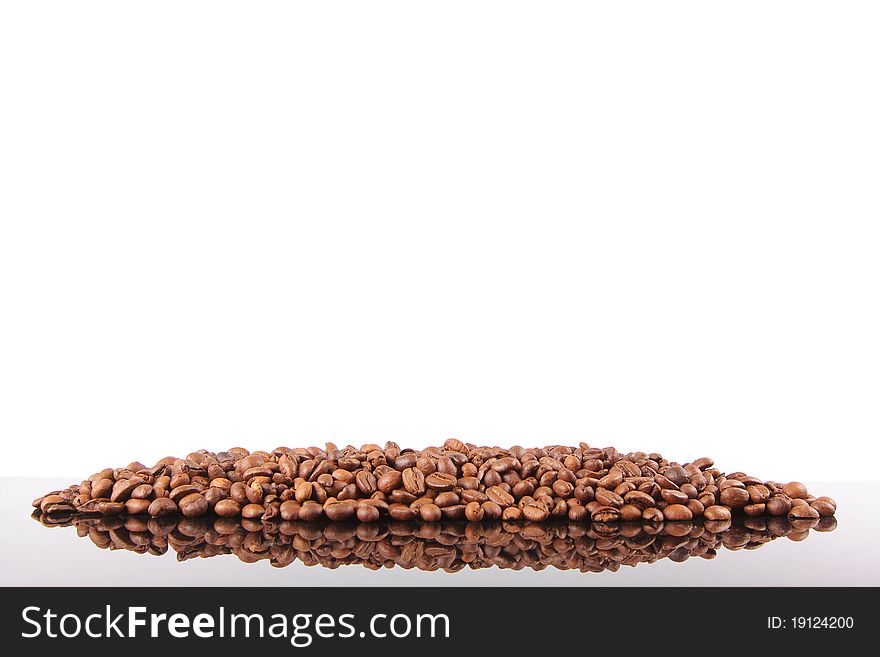 Coffee Beans background, reflected on black glass
