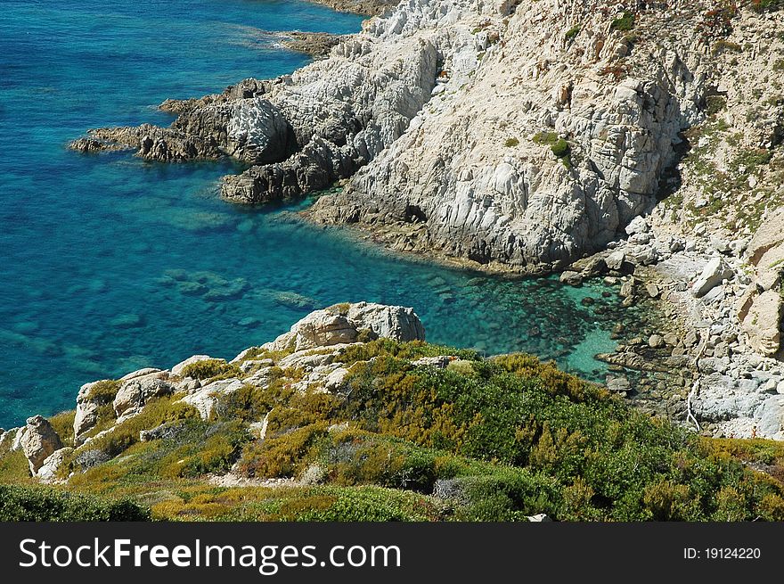 Rocky coastline with turquoise water in Corsica, France. Rocky coastline with turquoise water in Corsica, France