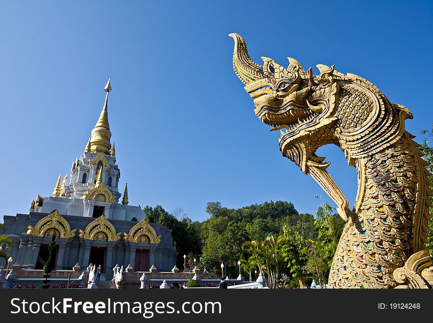 Great Naga Statue Look toward the Pagoda, Chiang Rai, Thailand. Great Naga Statue Look toward the Pagoda, Chiang Rai, Thailand.