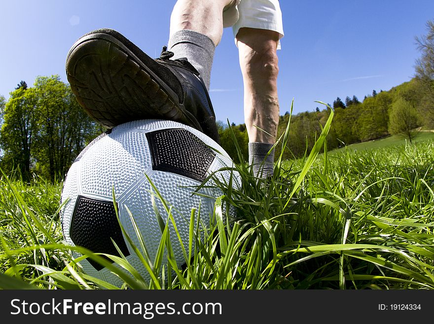 Wide angle shot of football soccer on grass