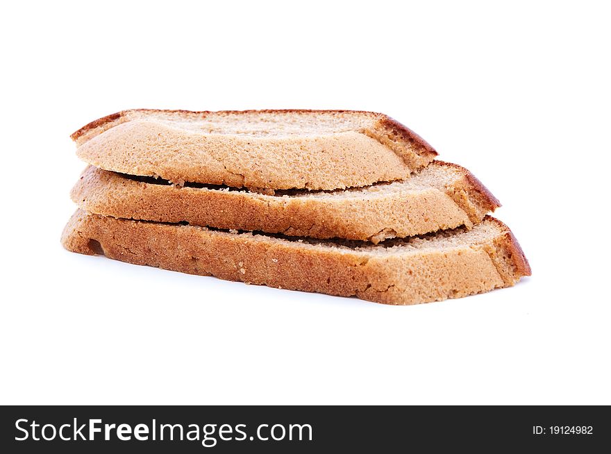Close up shot of sliced bread on white background